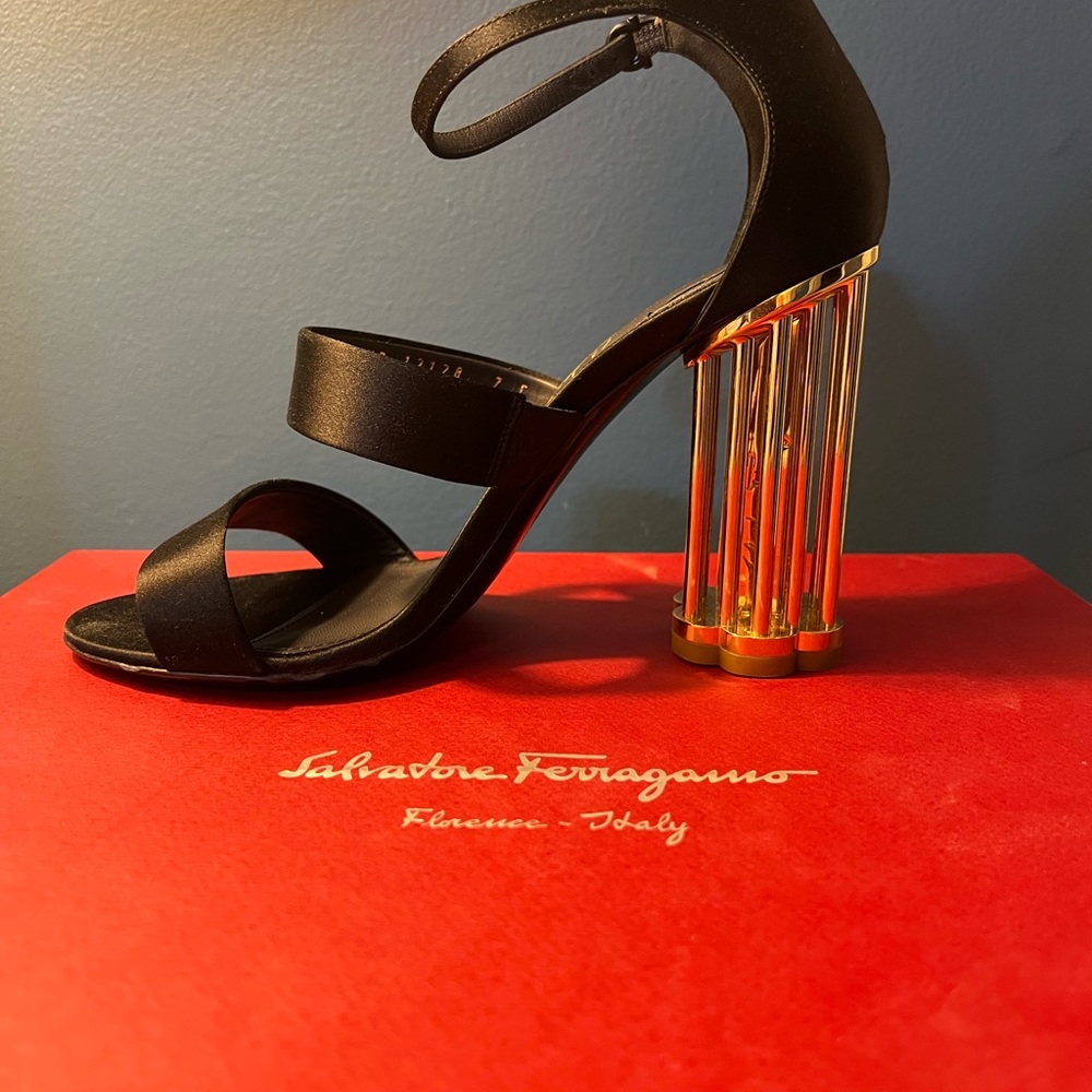 Salvatore Ferragamo Black Heels with Transparent Heel and Elegant Satin Straps.
